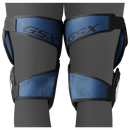 Bauer GSX ice hockey goalie knee guards in royal blue and black, worn on legs