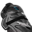 Close-up detail of Bauer Supreme F50 Pro ice hockey shin guard showing knee cap and strapping system