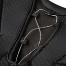 Close-up detail of black hockey shoulder pad lacing system with black and white cord
