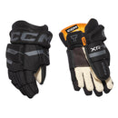CCM Tacks XR Pro youth ice hockey gloves in black and graphite, front and back view