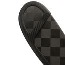Close-up detail of Bauer black off-ice blade protector showing checkered texture pattern