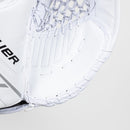 Close-up detail of white Bauer GSX ice hockey goalie catcher showing pocket webbing and stitching