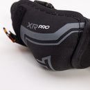 Close-up detail of CCM Tacks XR Pro ice hockey elbow pad showing logo and gray accents