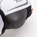 Close-up detail of CCM Tacks XR 80 elbow pad showing molded protective cap and mesh fabric