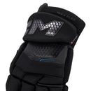 CCM Tacks XR Ghost senior ice hockey glove in black with hexagonal pattern detail close-up