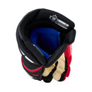 Top-down interior view of Sherwood ice hockey glove showing blue foam padding and tan palm