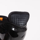 Close-up detail of CCM Tacks XR Pro youth shin guard showing padded tongue and hard shell cap