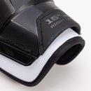 Close-up detail of CCM Tacks XR 80 shin guard showing 15-inch right sizing label and padding