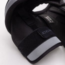 Close-up detail of CCM Tacks XR hockey shoulder pad showing velcro strap and padding construction