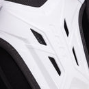 Close-up detail of CCM Tacks XR 80 shoulder pad showing white hard shell ventilation cutouts